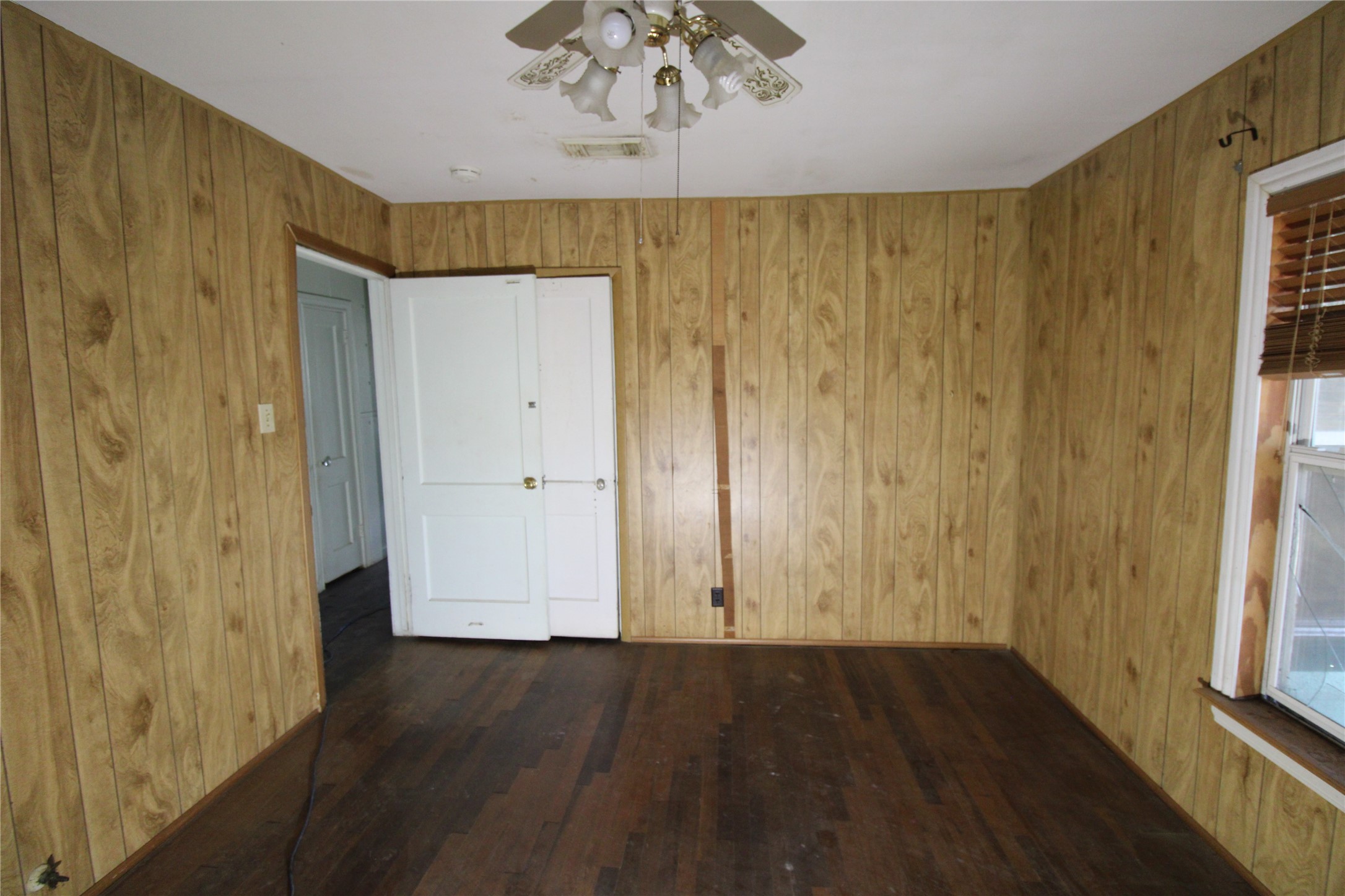 430 Winding Way Street Lake Jackson, TX 77566 - Photo 29 of 38 a view of a room with wooden floor and windows