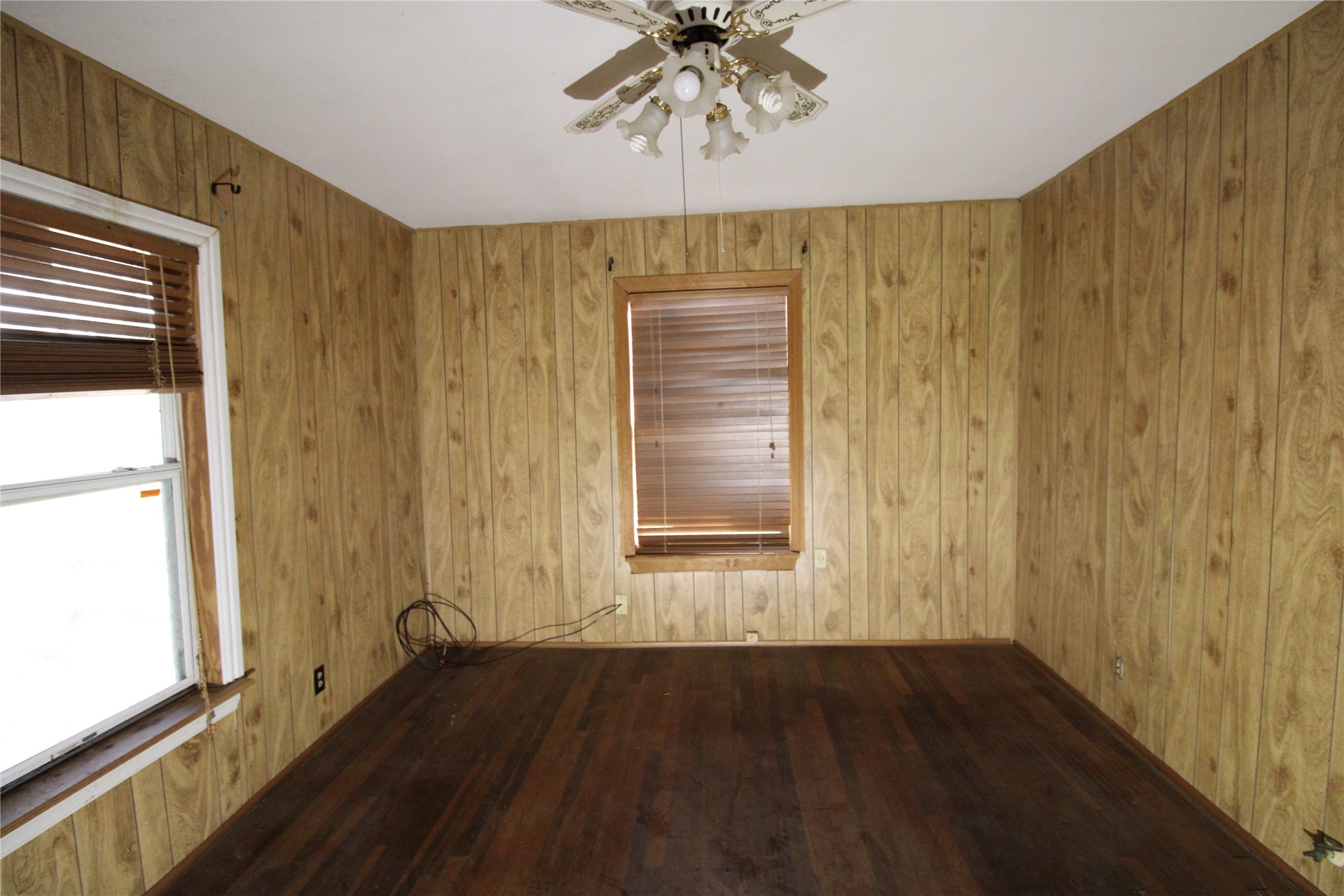 430 Winding Way Street Lake Jackson, TX 77566 - Photo 30 of 38 a view of an empty room with wooden floor and a window