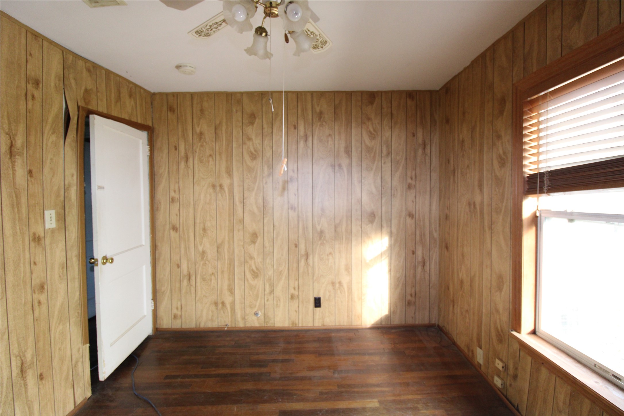 430 Winding Way Street Lake Jackson, TX 77566 - Photo 33 of 38 a view of an empty room with wooden floor and a window