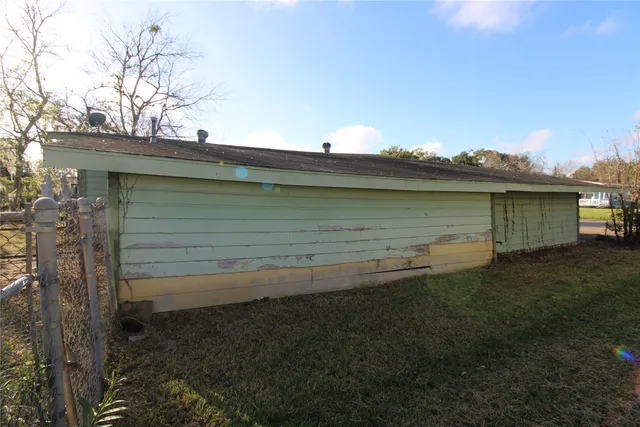 a view of a backyard with lake view and mountain view
