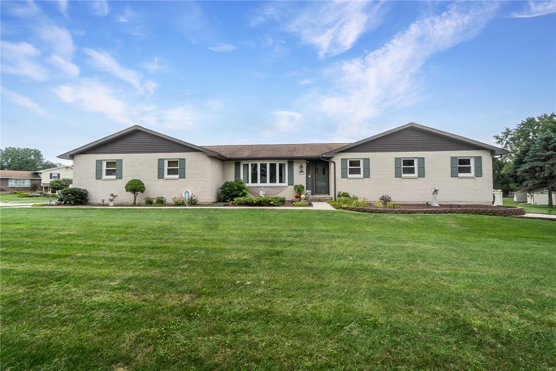 5728 Pheasant Road Bethlehem, PA 18017 - Photo 1 of 39 An expansive green lawn stretches out before this brick ranch style home.