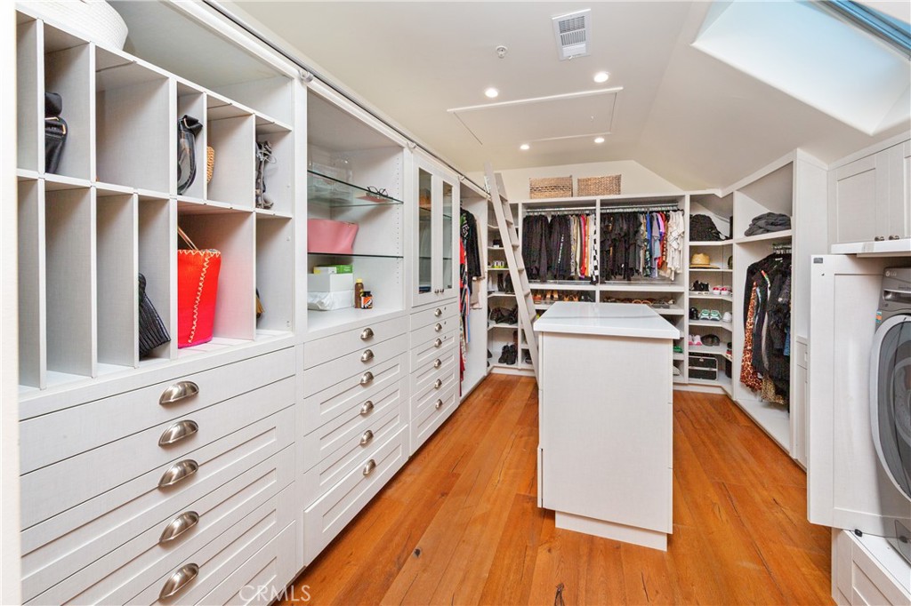 85 Saddlebow Road Bell Canyon, CA 91307 - Photo 41 of 75 a view of walk in closet with clothes and shoes