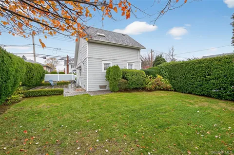 a house view with a garden space