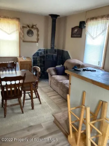 a bathroom with a toilet and a mirror