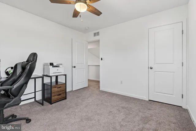 a view of a water fountain and a big yard