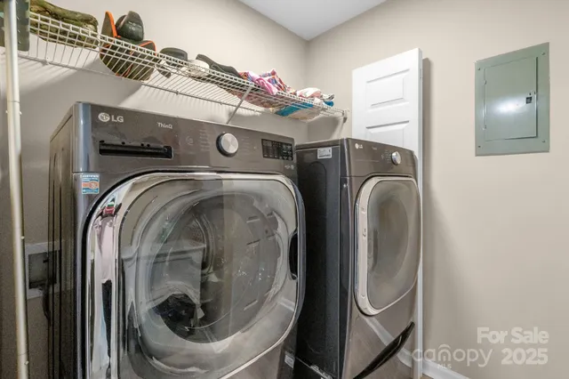 a utility room with dryer and washer
