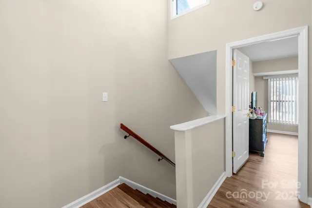 a view of hallway with stairs