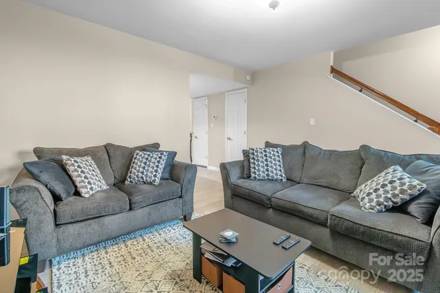 a living room with furniture and a couch