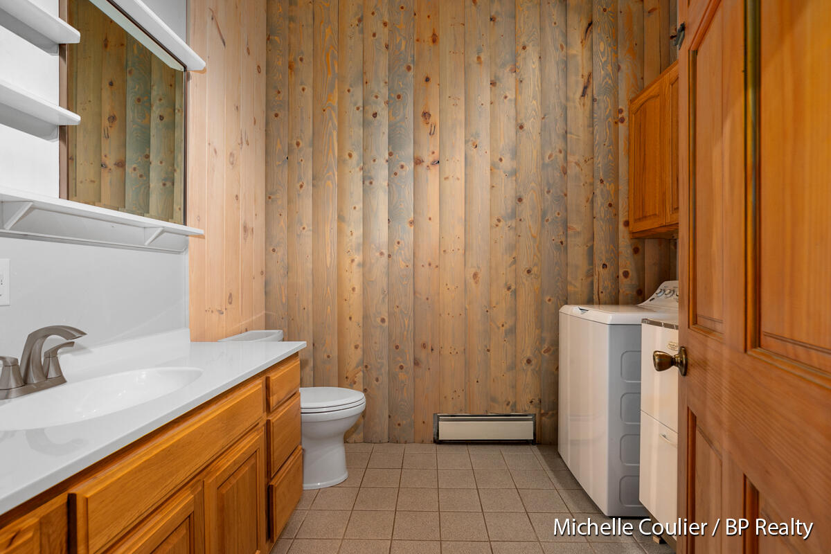 1147 Stakes Road Gowen, MI 49326 - Photo 22 of 105 laundry room and half bath