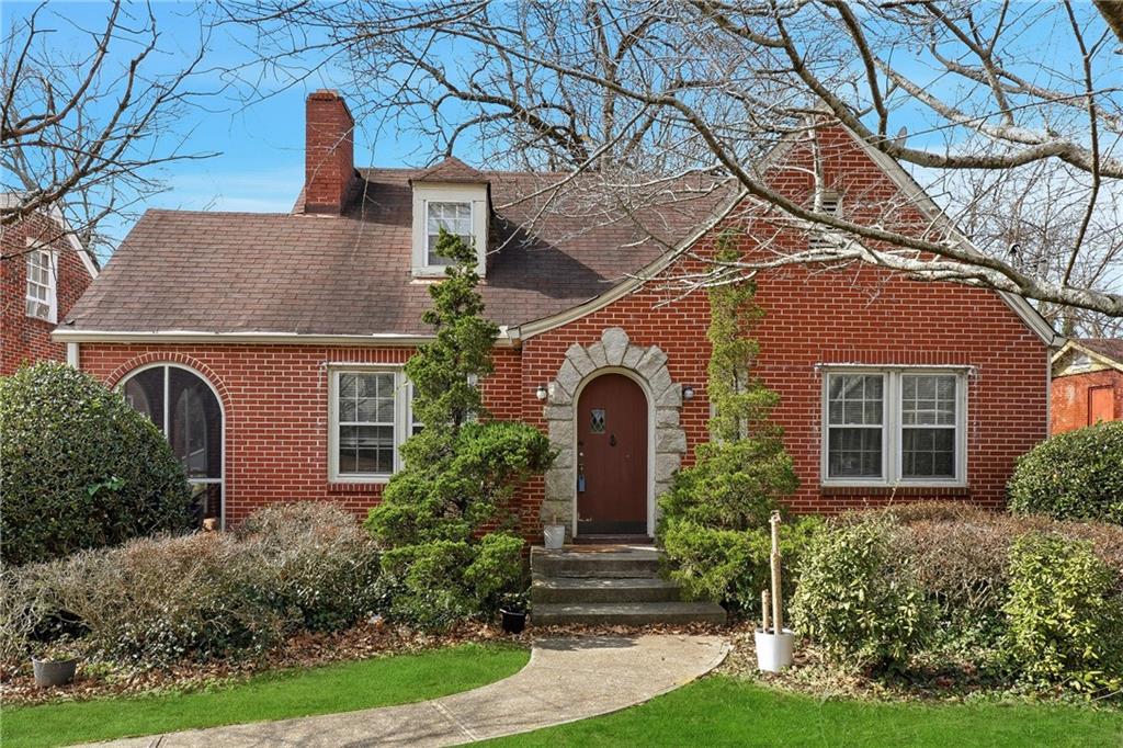 2300 Boulevard Granada Southwest Atlanta, GA 30311 - Photo 1 of 1 a front view of a house with garden