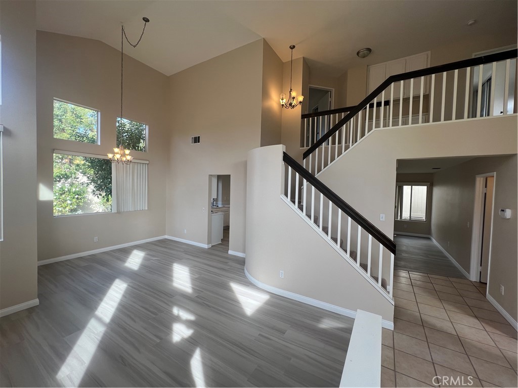 31264 Nice Avenue Mentone, CA 92359 - Photo 9 of 28 a view of entryway and hall with wooden floor