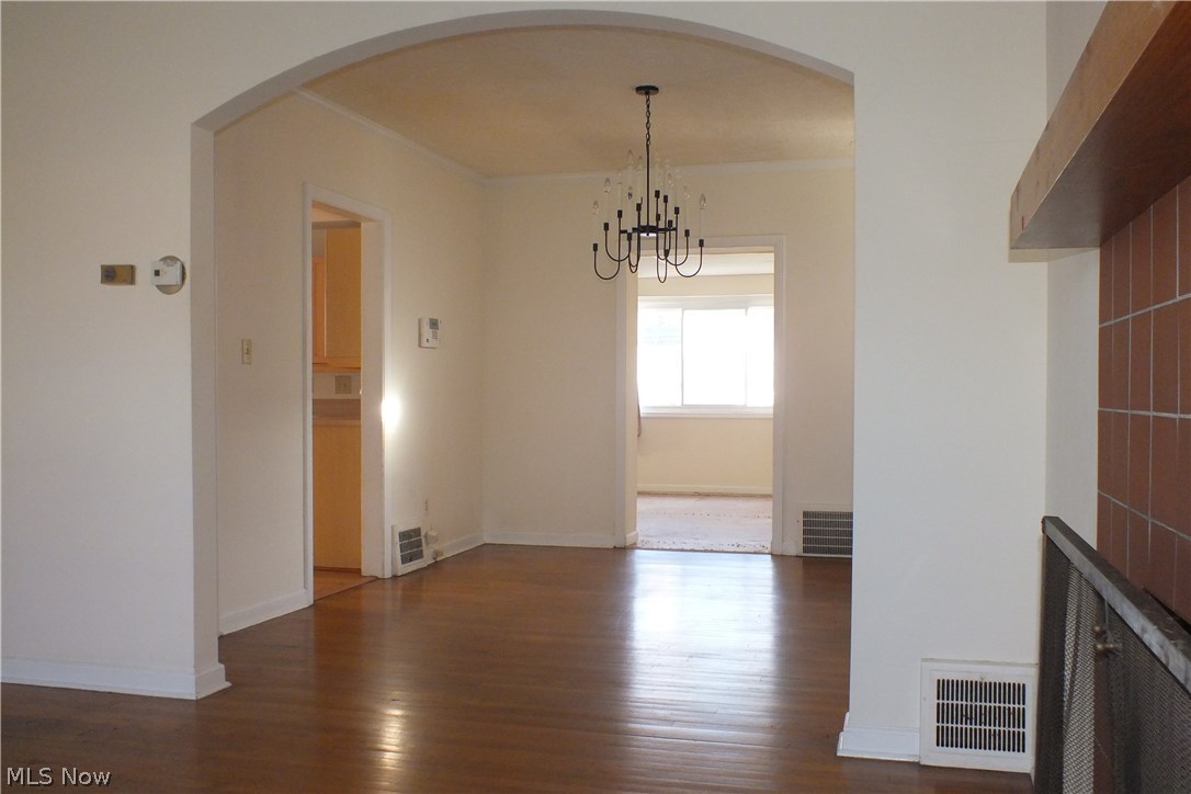 3844 Bethany Road Cleveland, OH 44118 - Photo 8 of 35 Looking from the living room fireplace through to the dining room with the family room in the far background