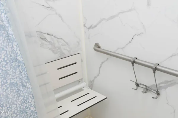 a bathroom with a toilet and a sink
