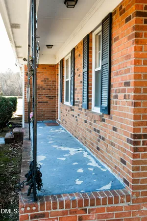 a view of balcony with patio