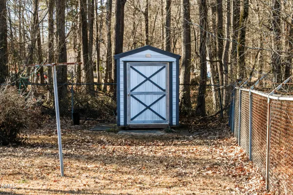 a view of entrance gate of a house