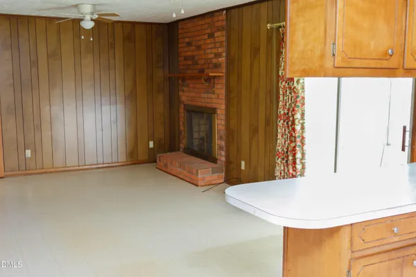 a view of a bathroom with a tub and shower
