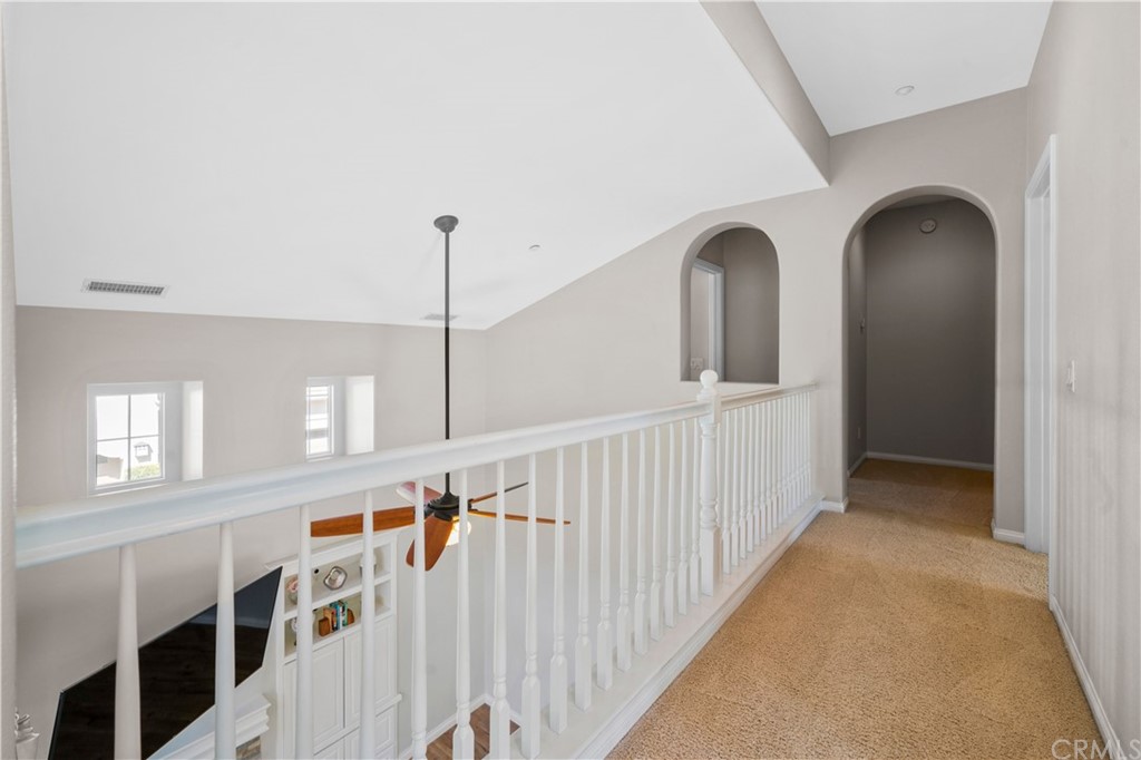 47 Walbert Lane Ladera Ranch, CA 92694 - Photo 11 of 25 a view of entryway with stairs and wooden floor