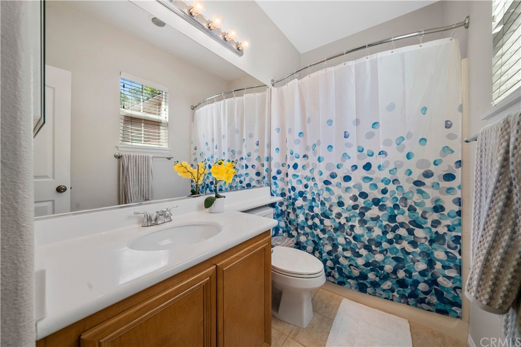 47 Walbert Lane Ladera Ranch, CA 92694 - Photo 18 of 25 a bathroom with a sink toilet and shower