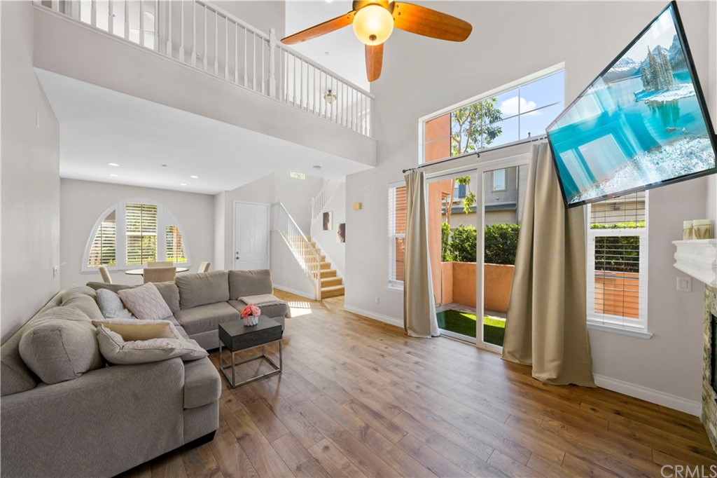 47 Walbert Lane Ladera Ranch, CA 92694 - Photo 6 of 25 a living room with furniture and a wooden floor