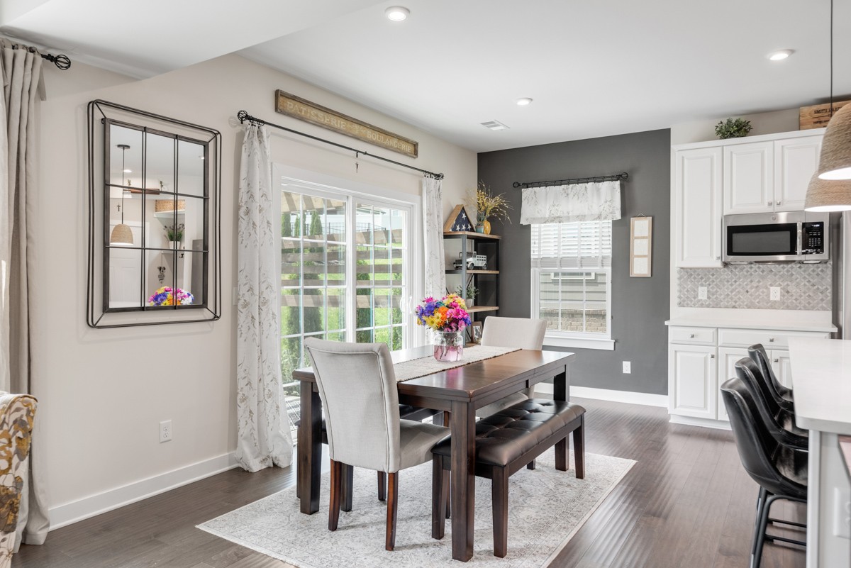 311 Collier Road Mount Juliet, TN 37122 - Photo 16 of 40 a view of a dining room with furniture window and outside view