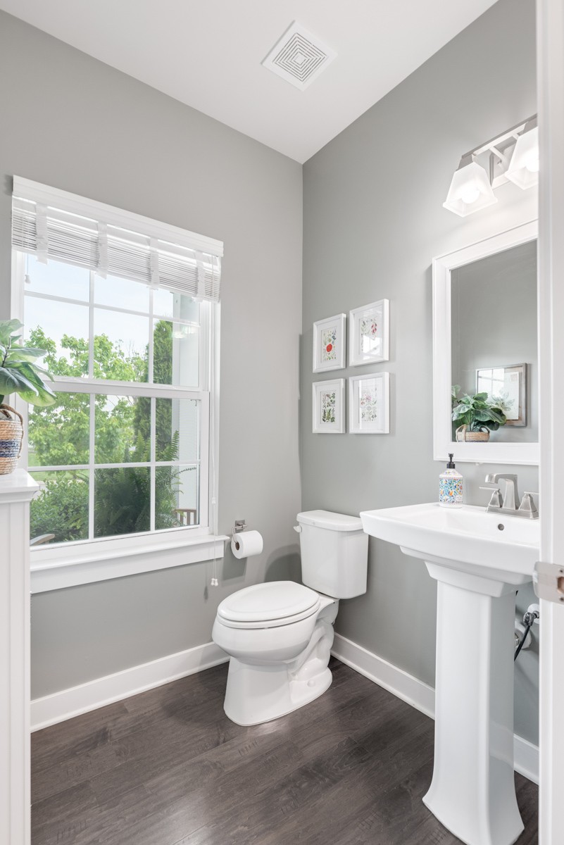 311 Collier Road Mount Juliet, TN 37122 - Photo 18 of 40 a bathroom with a sink toilet mirror and a tub