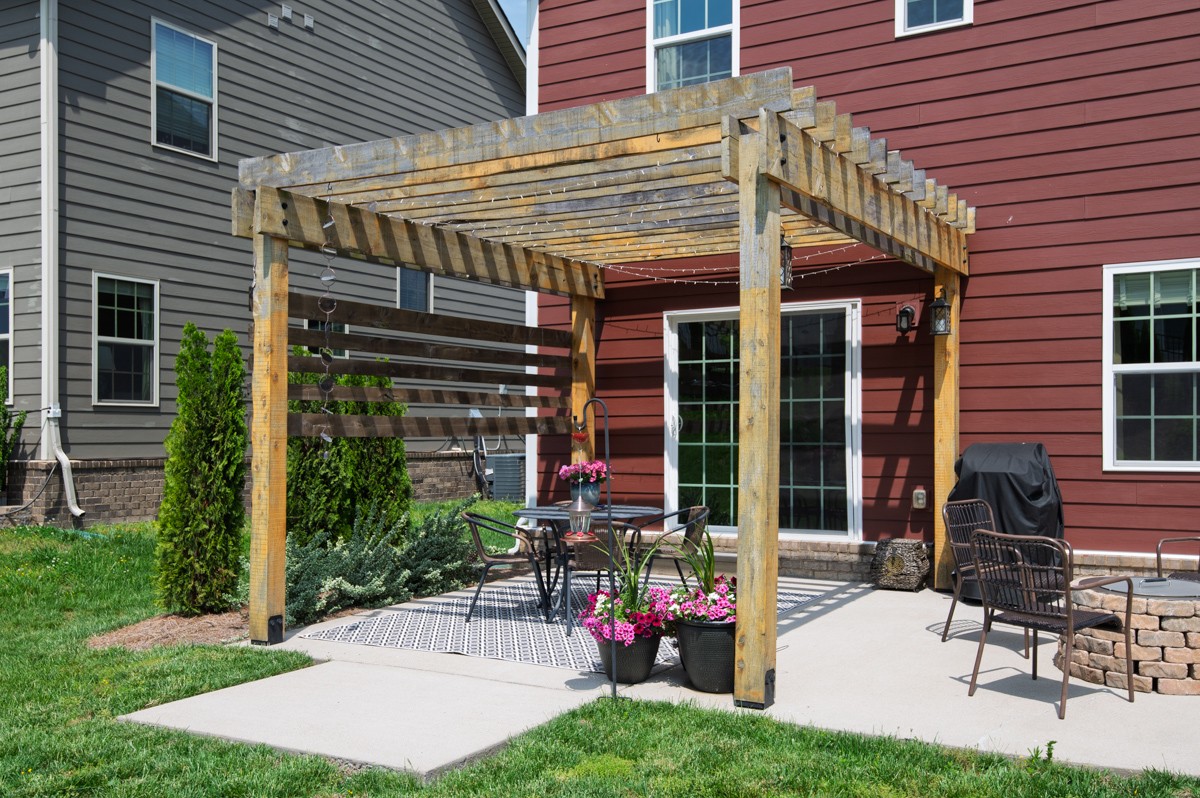 311 Collier Road Mount Juliet, TN 37122 - Photo 34 of 40 a view of a patio with table and chairs and potted plants