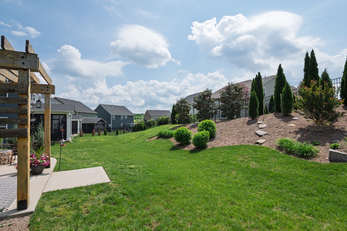 311 Collier Road Mount Juliet, TN 37122 - Photo 37 of 40 a view of a garden with a large tree
