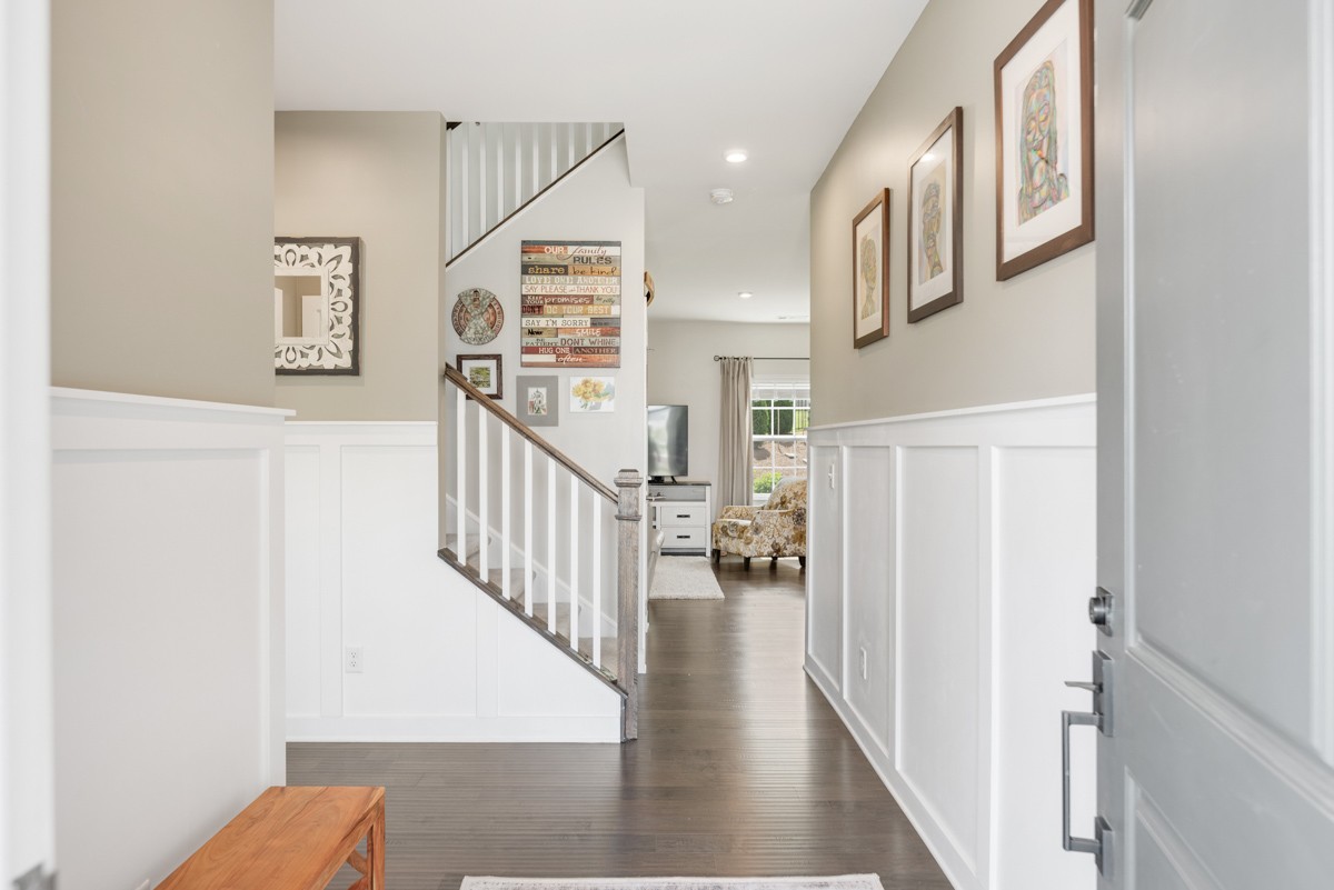 311 Collier Road Mount Juliet, TN 37122 - Photo 5 of 40 a view of staircase with lots of frames on wall and stairs
