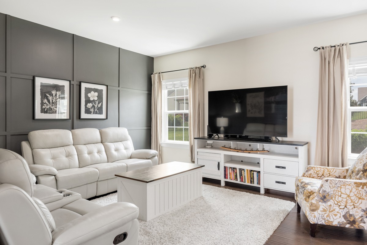 311 Collier Road Mount Juliet, TN 37122 - Photo 7 of 40 a living room with furniture and a flat screen tv