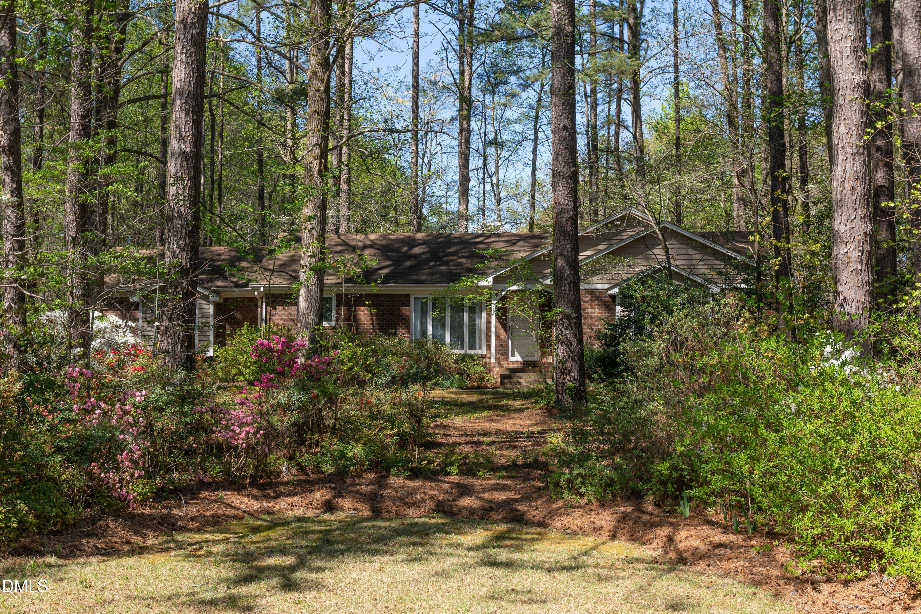 6119 Splitrock Trail Apex, NC 27539 - Photo 1 of 58 a view of a house with a yard and sitting area