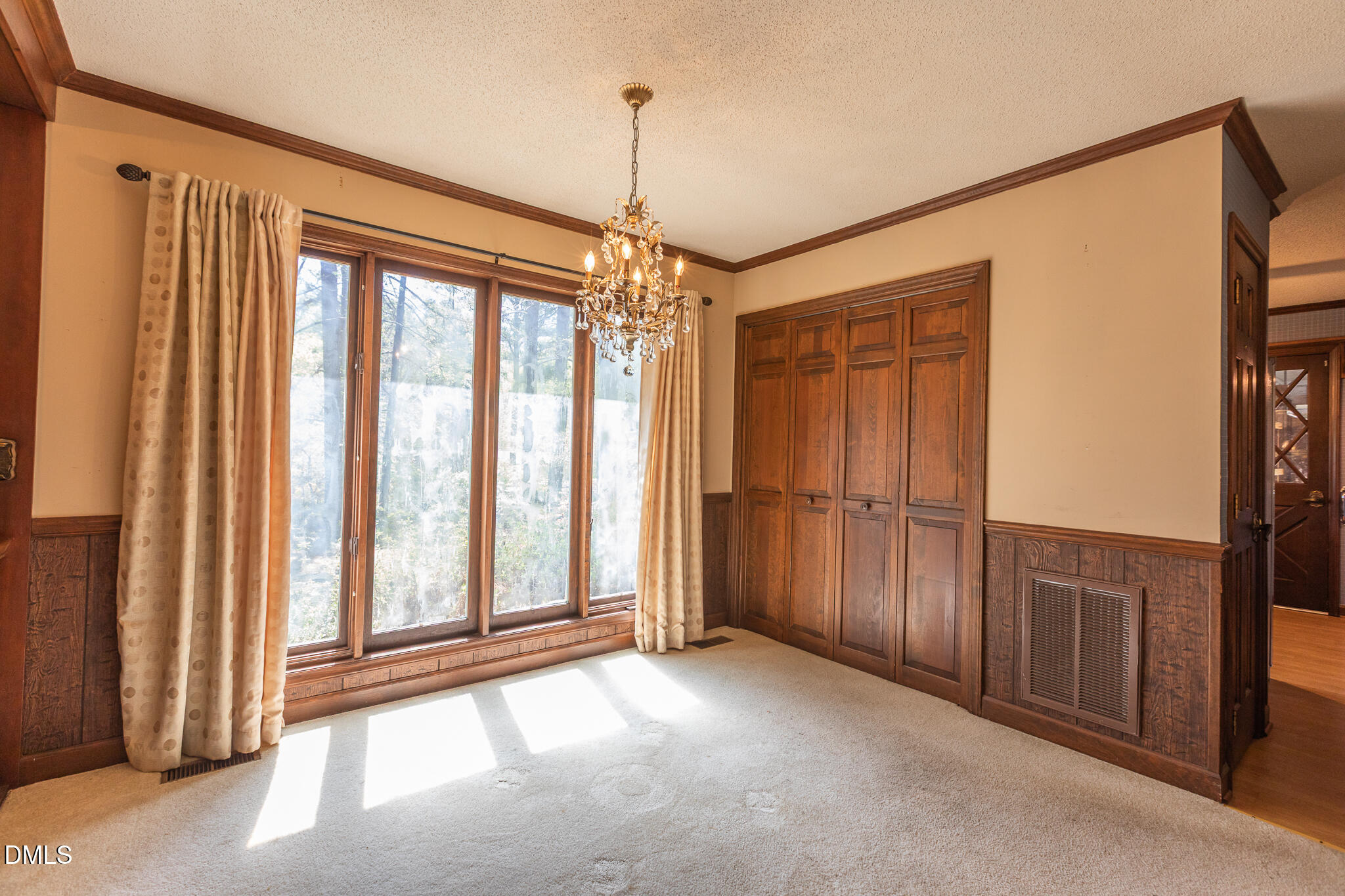 6119 Splitrock Trail Apex, NC 27539 - Photo 12 of 58 a view of a room with a large window
