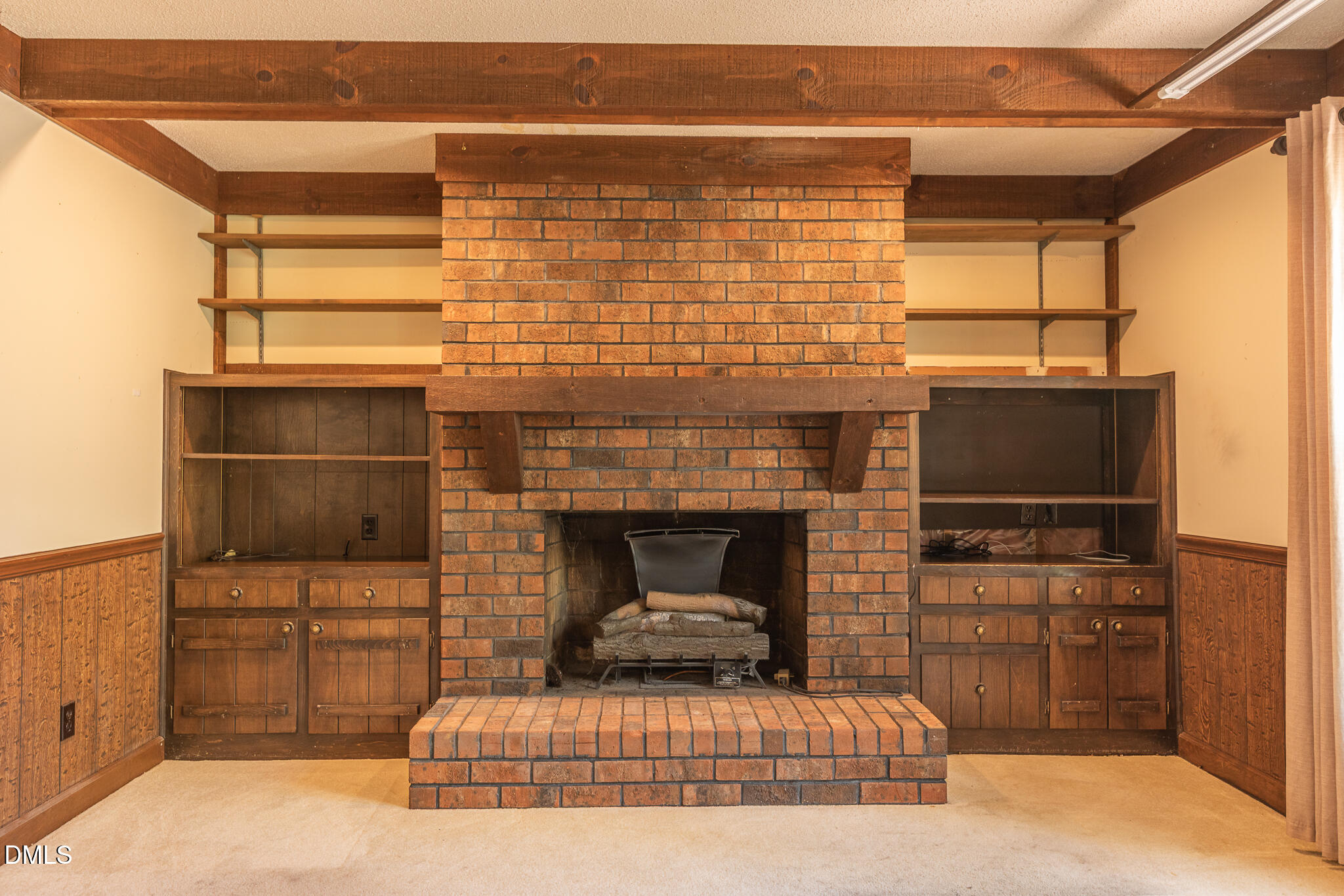 6119 Splitrock Trail Apex, NC 27539 - Photo 15 of 58 a living room with furniture flat screen tv and a fireplace