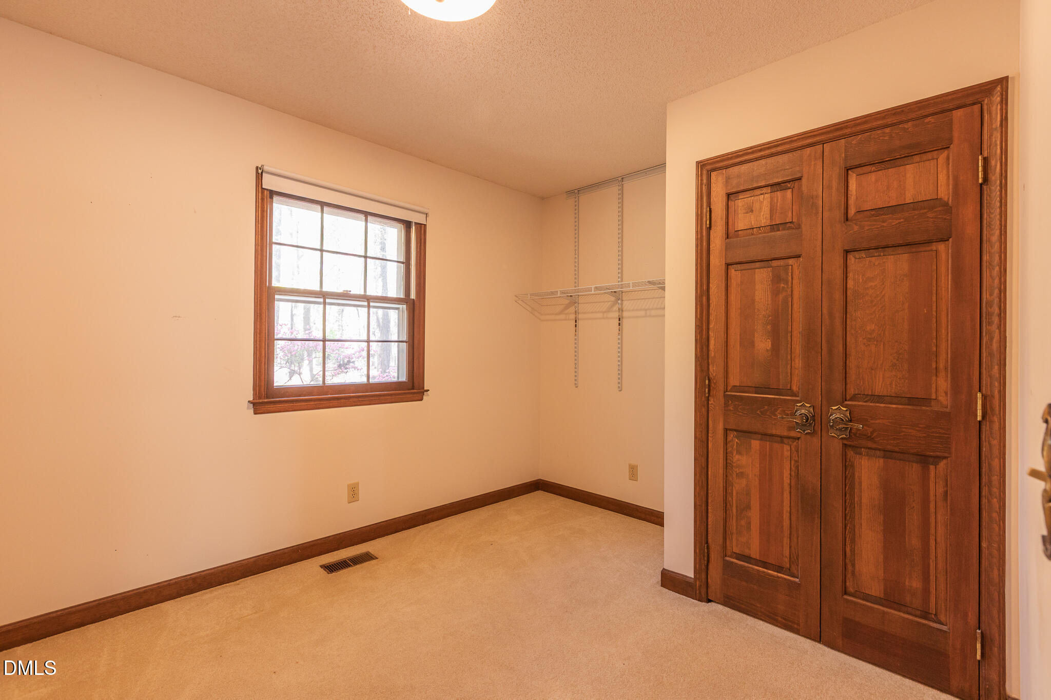 6119 Splitrock Trail Apex, NC 27539 - Photo 23 of 58 an empty room with windows