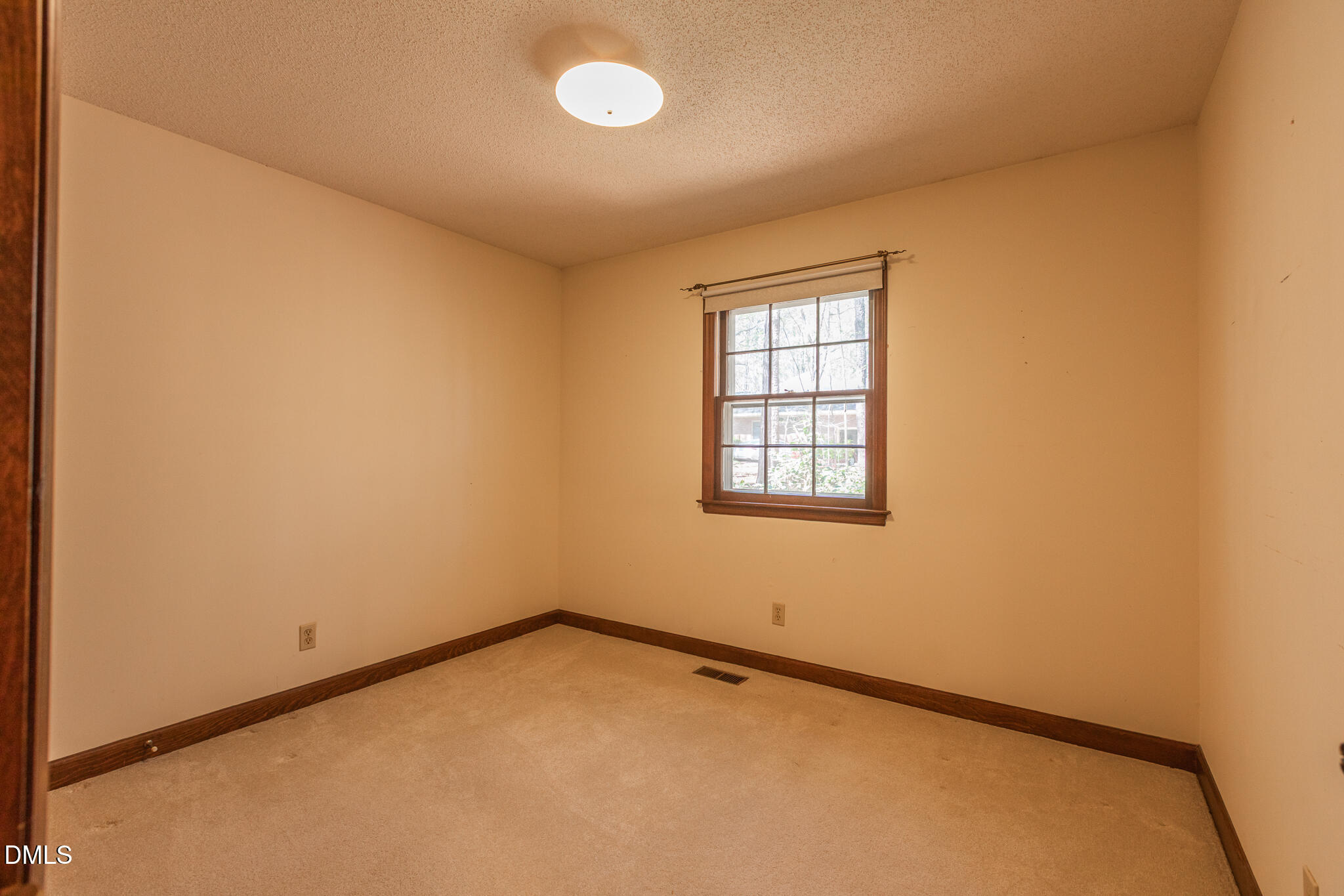 6119 Splitrock Trail Apex, NC 27539 - Photo 25 of 58 an empty room with a window
