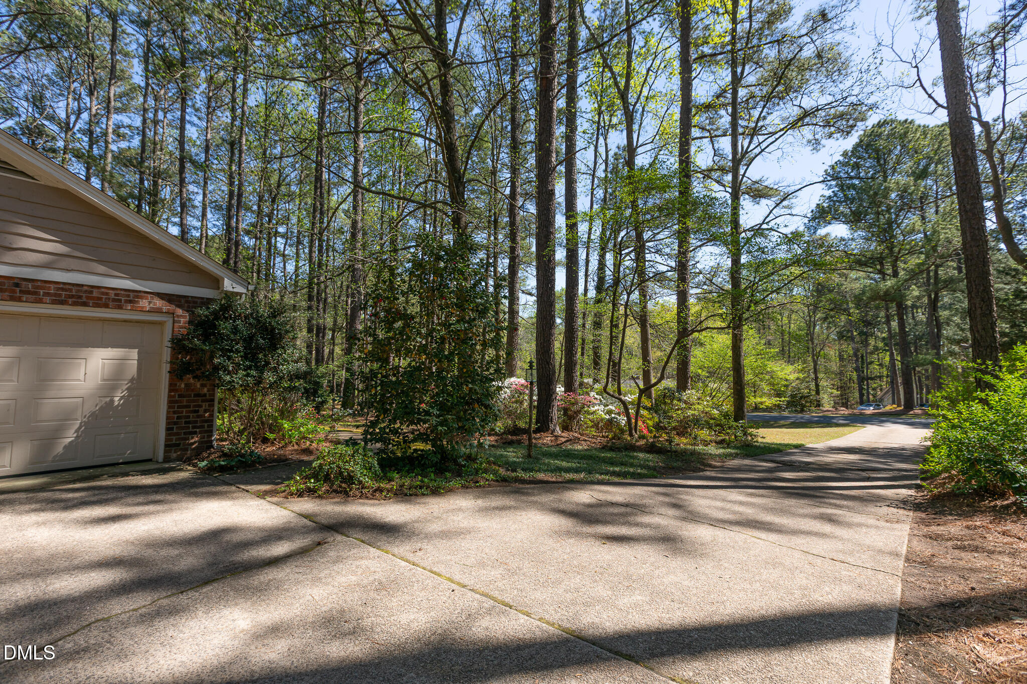 6119 Splitrock Trail Apex, NC 27539 - Photo 48 of 58 a view of a house with a yard next to a road