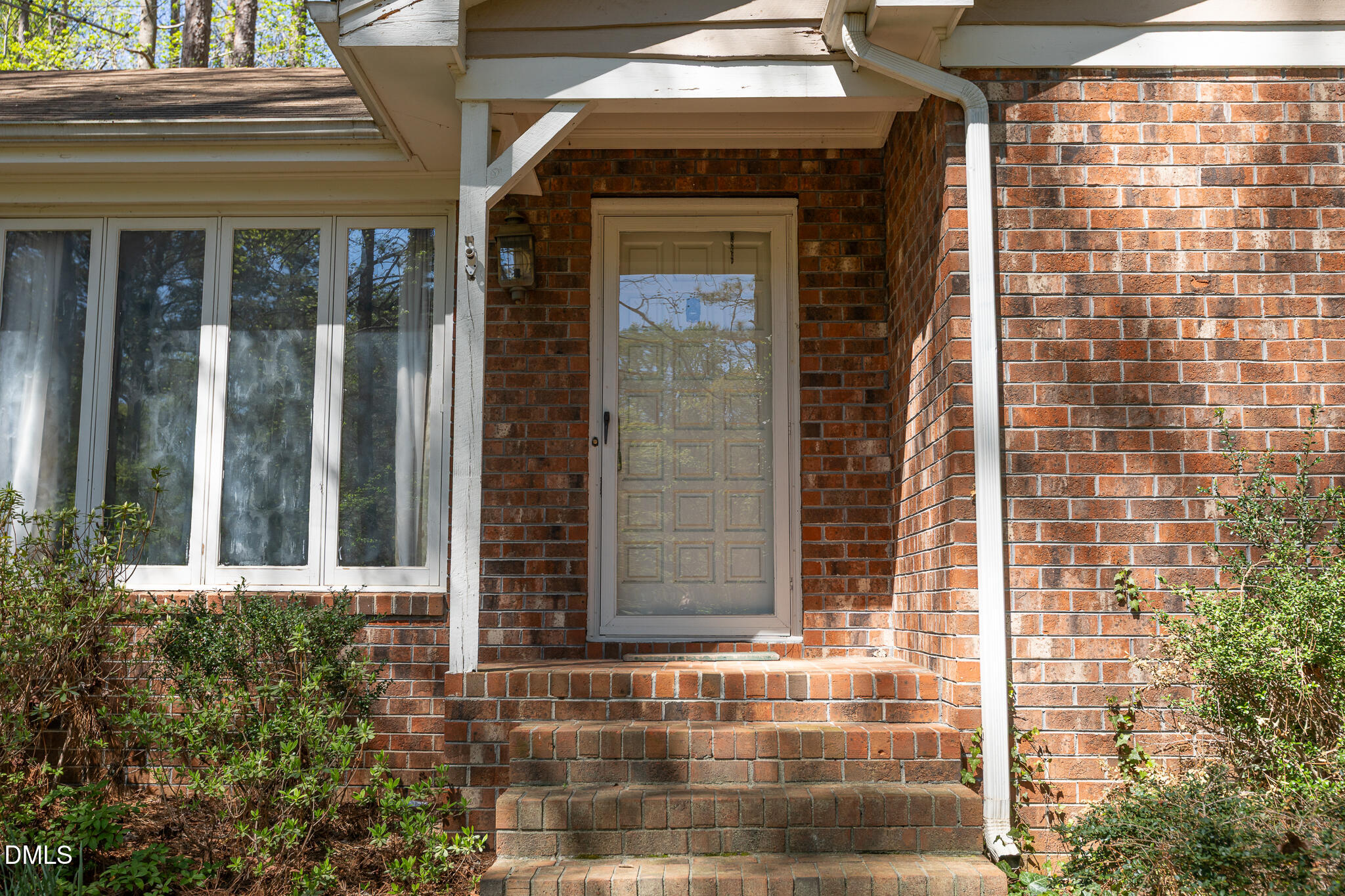6119 Splitrock Trail Apex, NC 27539 - Photo 58 of 58 a front view of a house with a glass windows
