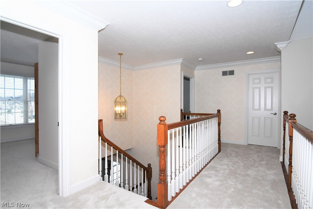 659 Sunridge Road Fairlawn, OH 44333 - Photo 18 of 35 2nd floor hall overlooking 2 story foyer and 2 story great room