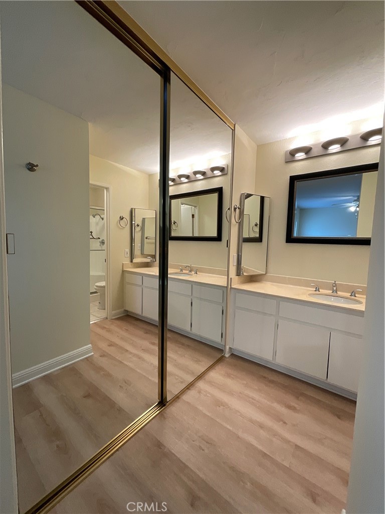 7053 Seawind Drive Long Beach, CA 90803 - Photo 28 of 47 a large kitchen with cabinets and stainless steel appliances