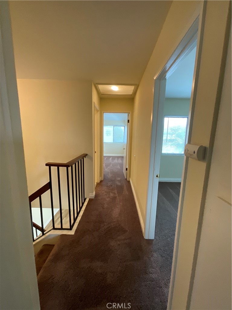 7053 Seawind Drive Long Beach, CA 90803 - Photo 32 of 47 a view of a hallway with a hallway
