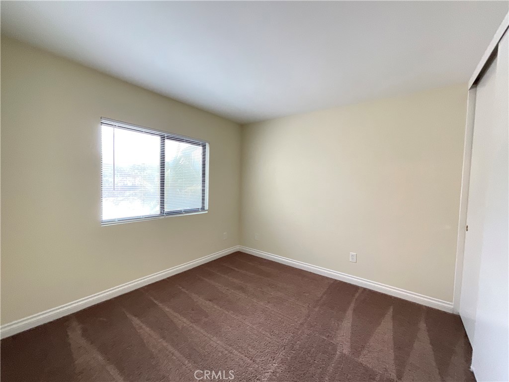 7053 Seawind Drive Long Beach, CA 90803 - Photo 34 of 47 an empty room with a window