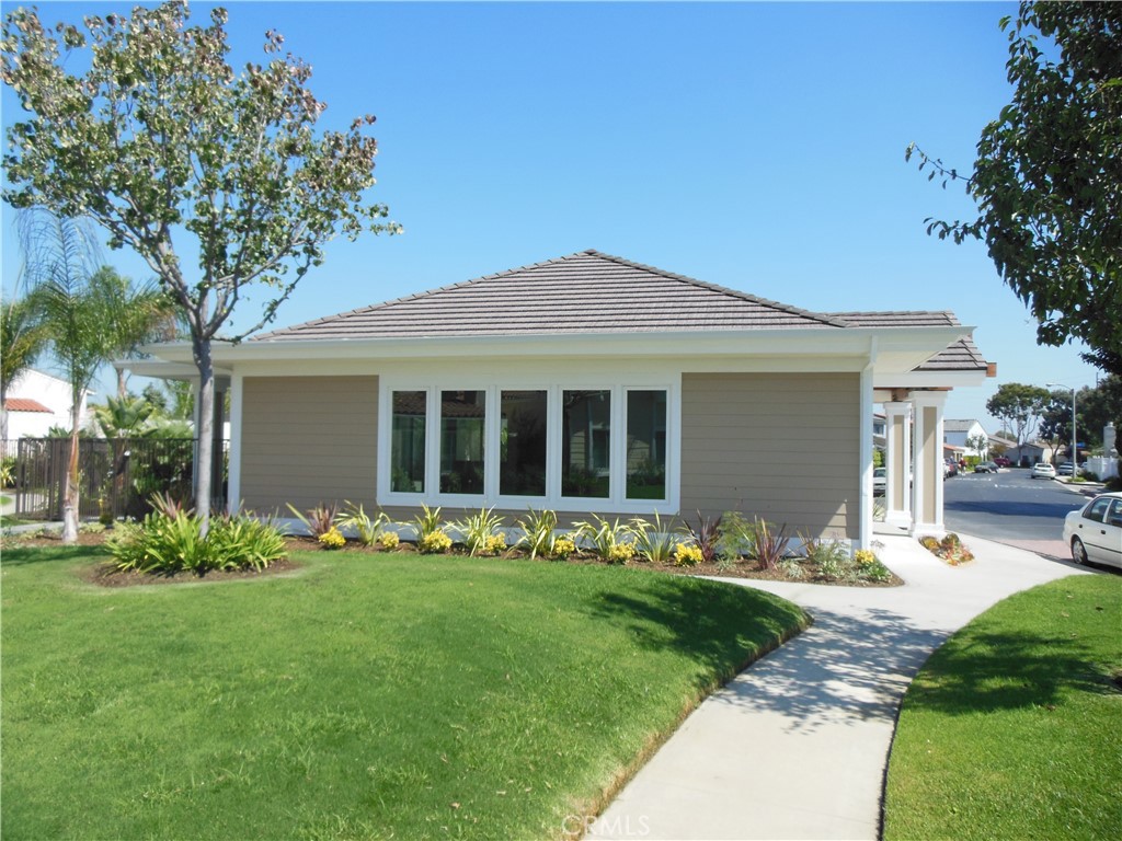 7053 Seawind Drive Long Beach, CA 90803 - Photo 45 of 47 a front view of a house with garden