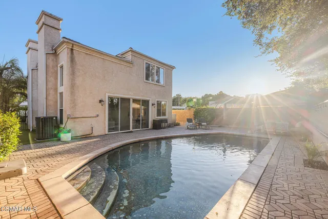 a house view with a garden space