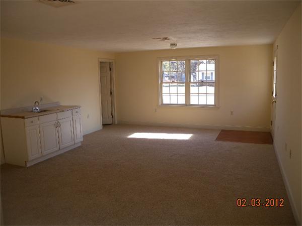 1 Howard Road Hudson, MA 01749 - Photo 3 of 7 a view of empty room with window