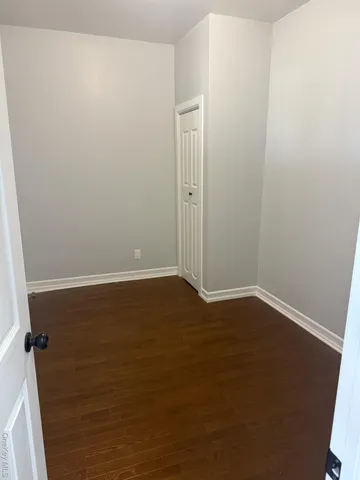 a view of small space with wooden floor