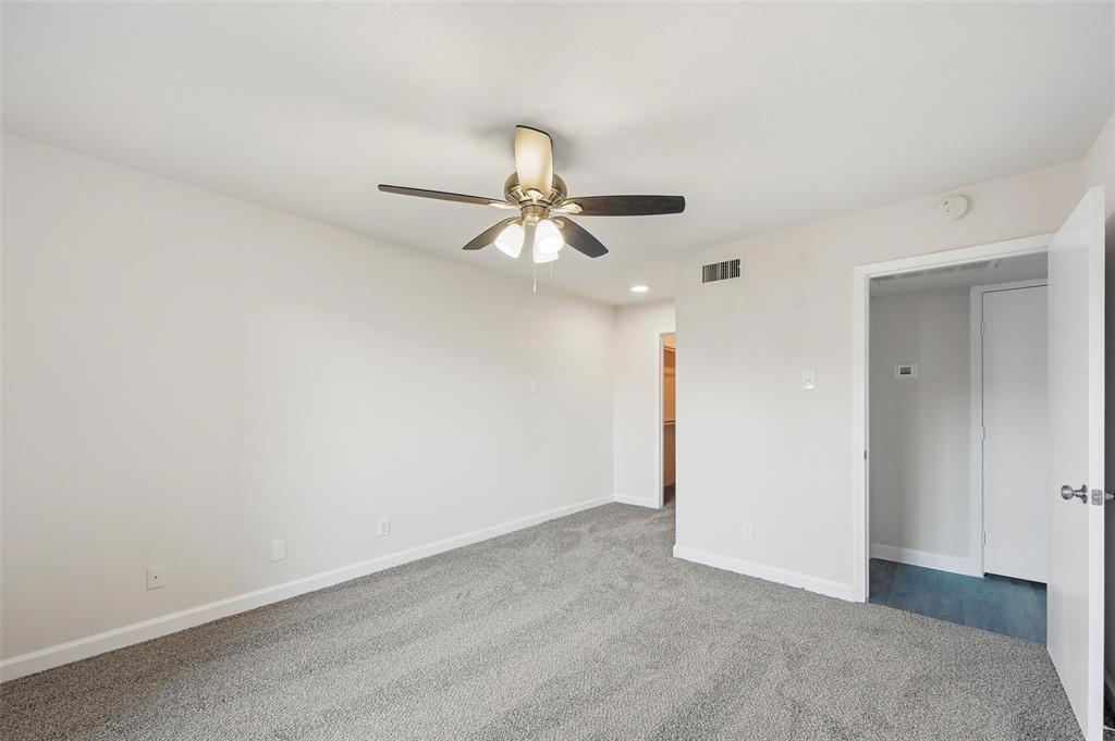 4859 Cedar Springs Road, Unit 136 Dallas, TX 75219 - Photo 21 of 28 wooden floor in an empty room