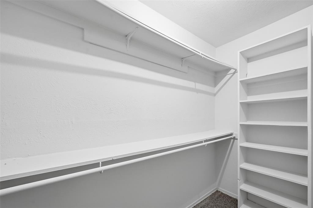 4859 Cedar Springs Road, Unit 136 Dallas, TX 75219 - Photo 24 of 28 a close up view of closet