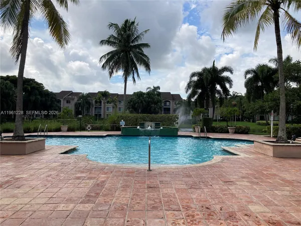 a view of a house with a yard and a stove