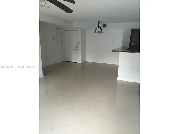 a view of a workspace with furniture