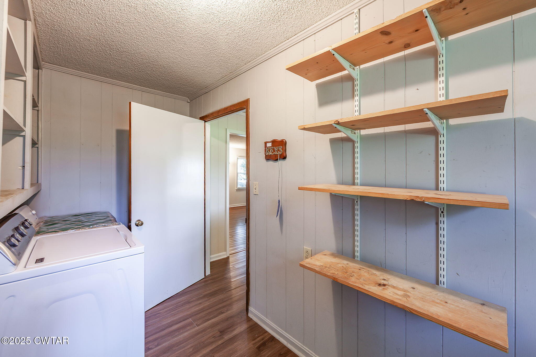 1140 Plainview Road Henderson, TN 38340 - Photo 16 of 29 a view of cabinets and wooden floor