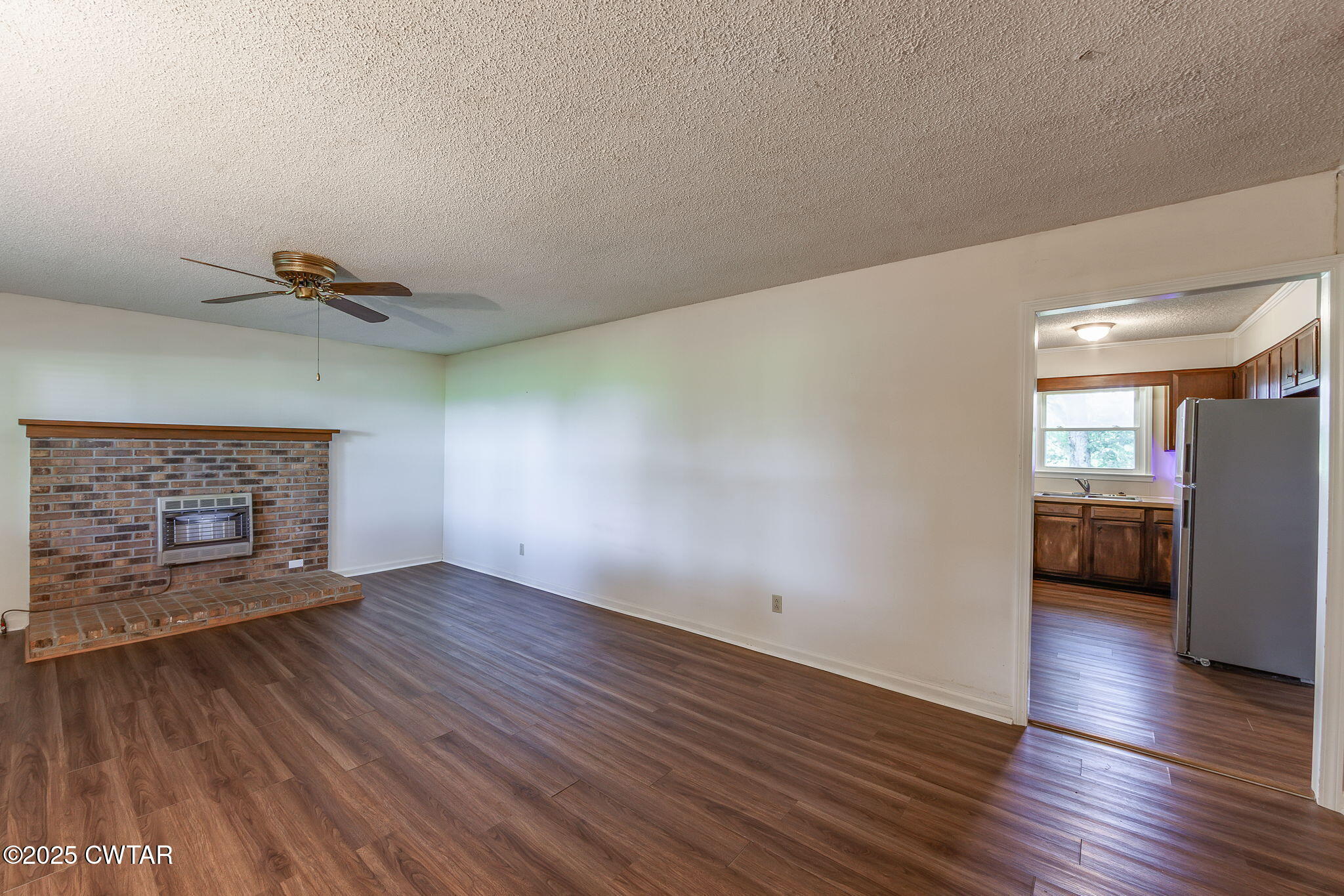 1140 Plainview Road Henderson, TN 38340 - Photo 17 of 29 wooden floor in an empty room